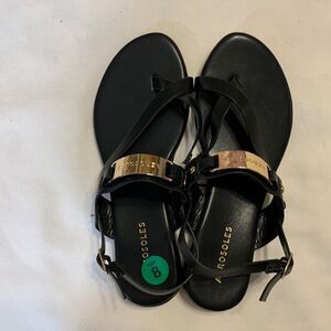 Aerosoles black dressy sandals with hole buckle.  Very classy!